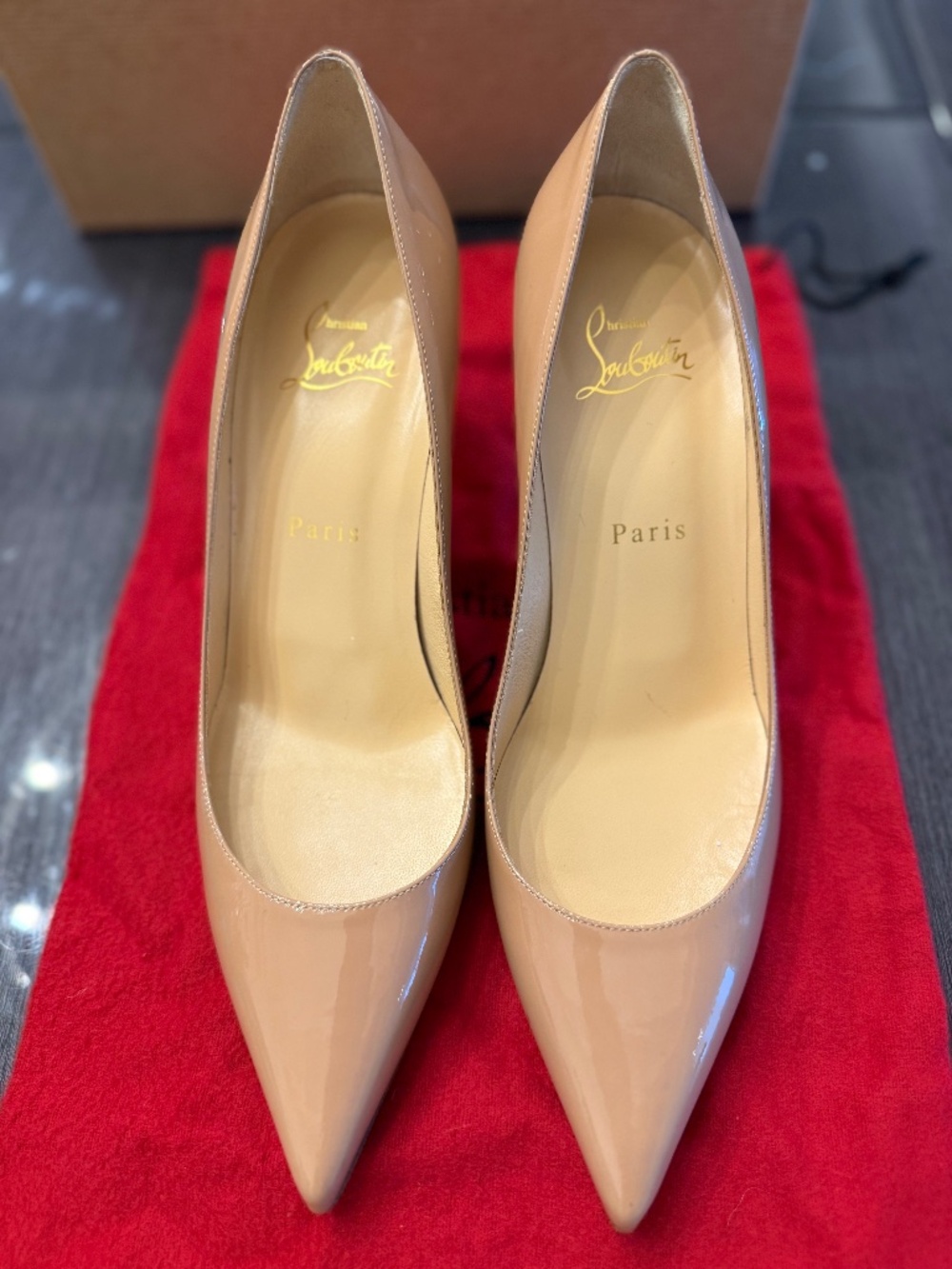 Women’s Christian Louboutin nude pumps